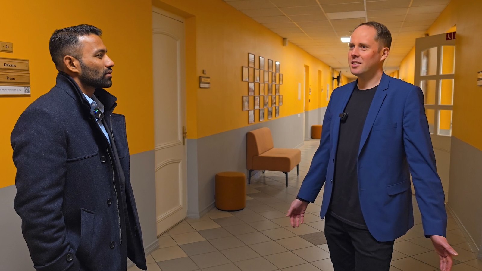 Our colleague in conversation with an LBTU representative in a corridor at LBTU