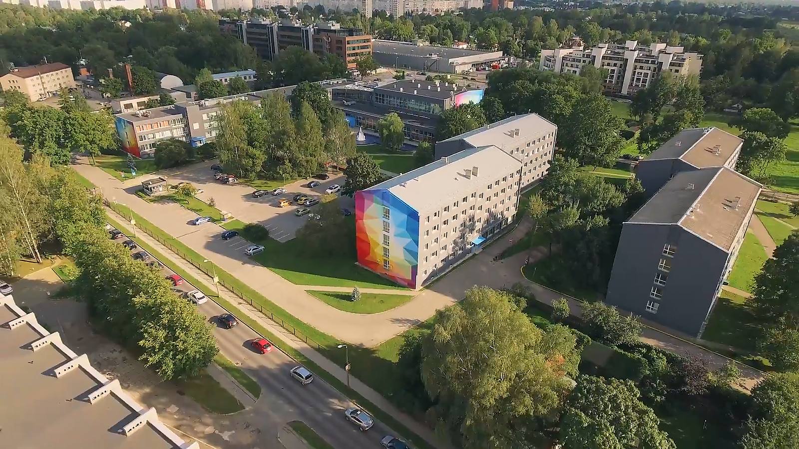Turība's campus in Riga from the air, with a residence block painted in rainbow colours